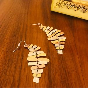 Women’s chandelier type statement earrings.